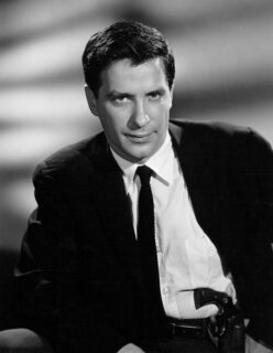 Black and white portrait of John Cassavetes.
