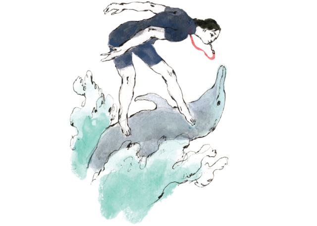 Woman in a blue swimsuit blowing a whistle on a red cord while surfing on a dolphin's belly